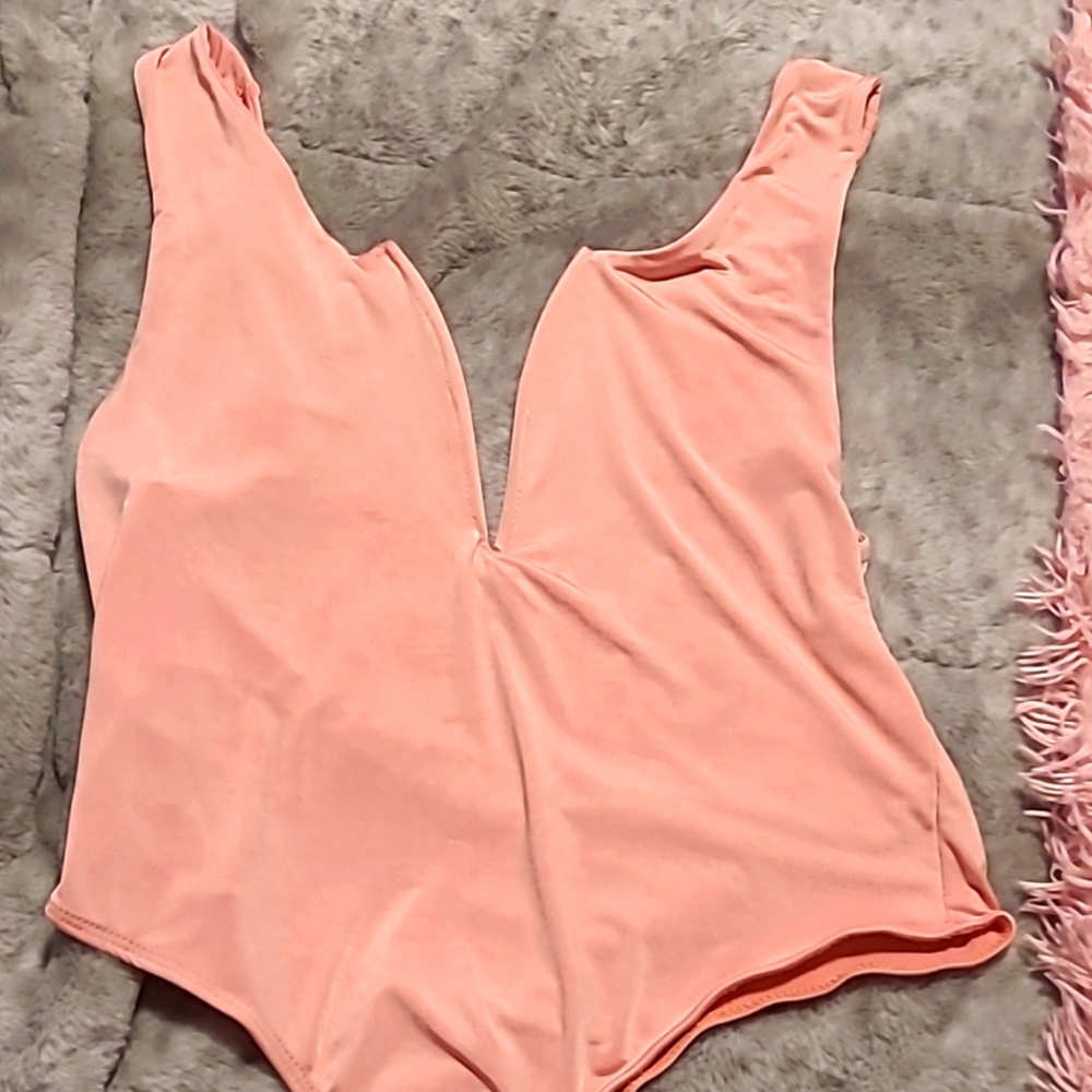 Beautiful thong ultra plung neck bodysuit in rose pink